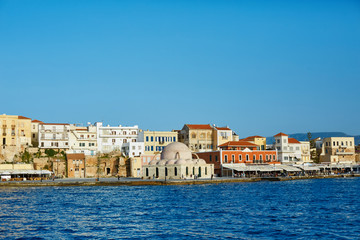 Fototapeta na wymiar waterfront of Chania bay at sunny summer day, Crete, Greece