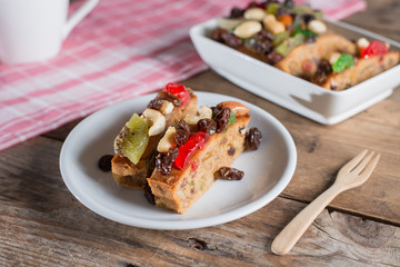 Slices of dried fruits cake. Selective focus.