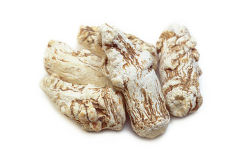 dang gui, angelica sinensis, dang gui ginseng on white background, traditional chinese herbal medicine.