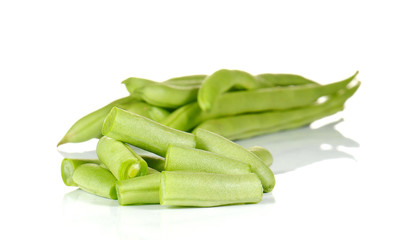 String bean cut pieces on white background.