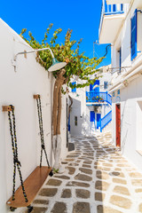 A view of whitewashed cycladic street in beautiful Mykonos town, Cyclades islands, Greece © pkazmierczak
