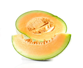 Melon cut pieces on white background.