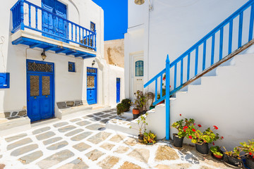 A view of whitewashed street with typical Greek architecture in beautiful Mykonos town, Cyclades islands, Greece © pkazmierczak