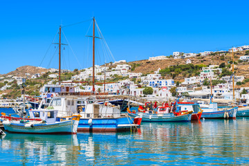 Fishing and sailing boats in Mykonos port, Cyclades islands, Greece