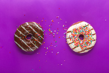 Donuts on color background.