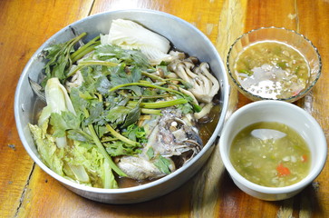 steam mango fish with vegetable in stainless steamer pot and sauce