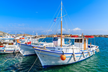 Typical Greek white fishing boats in Naoussa port, Paros island, Cyclades, Greece