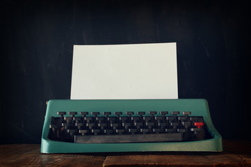 Photo of vintage typewriter with blank page
