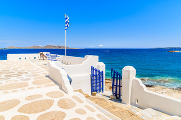 A viewpoint terrace overlooking sea bay in Naoussa village, Paros island, Greece