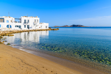 A view of beach in Naoussa village at sunrise time, Paros island, Cyclades, Greece