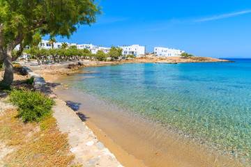 Crystal clear turquoise sea water of a beach in Naoussa village, Paros island, Cyclades, Greece