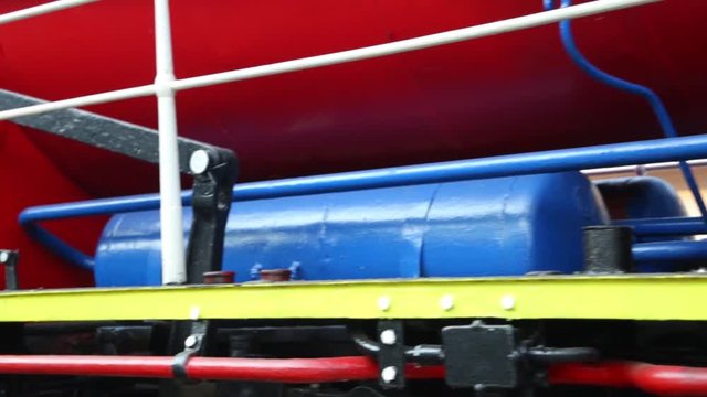 Close up of historic retro steam train in the forest
