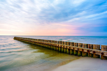Fototapeta na wymiar Beautiful sunset on beach in Leba coastal town, Baltic Sea, Poland