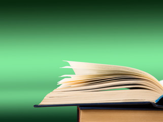 Open book on the color gradient background, space for text