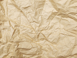 Old blank crumpled paper in yellow tone