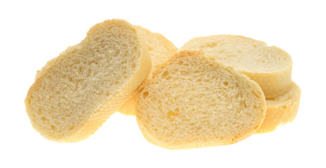 Small sliced French bread isolated on a white background side view.