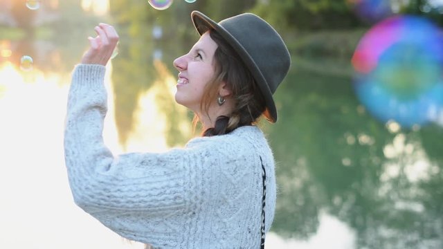Woman catching soap suds