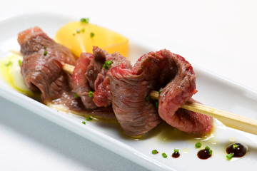 Skewer of beef.
