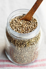 organic dried hemp seeds in a glass bowl