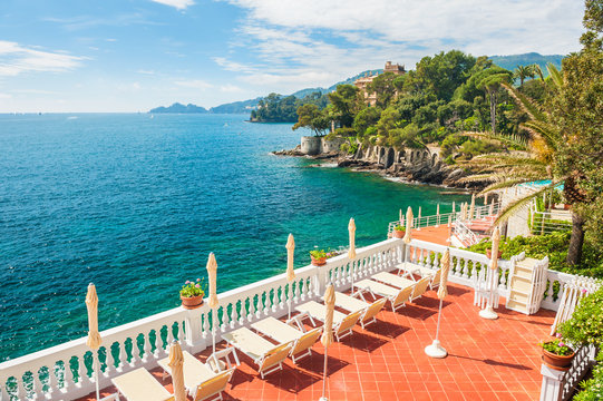 Terrace with deck chairs overlooking the sea
