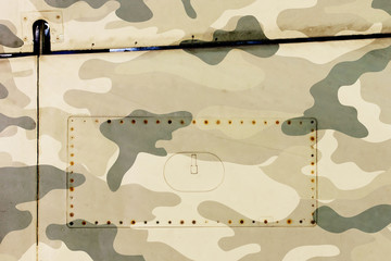 Piece of aircraft grunge metal background, army camo