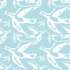 Seamless pattern with flying birds. Vector clip art.