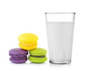 fresh milk in the glass and  macaroonson white background
