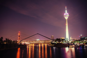 Night city landscape Dyusildorf. Media harbor. Germany. Soft lig