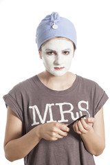 girl with clay face mask