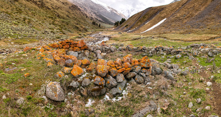 stone walls of ancient homes in the mountains