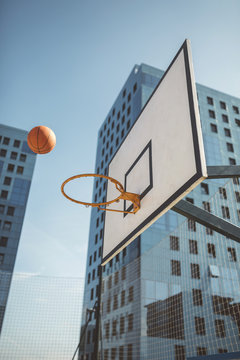 Basketball flying towards hoop