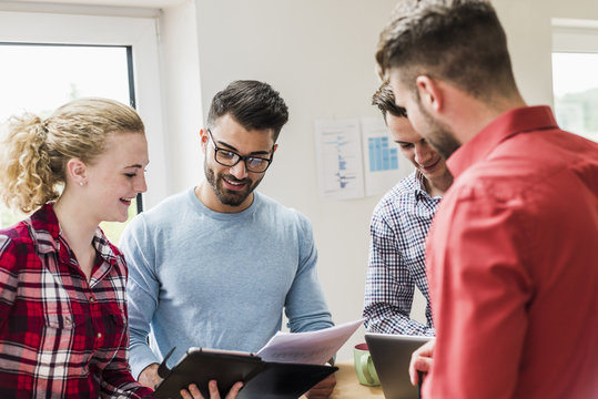 Young professionals working in office