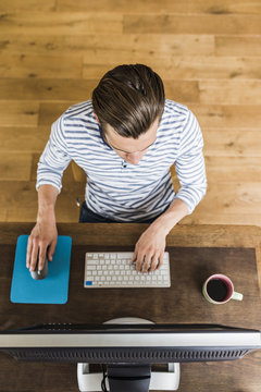 Man using computer at desk