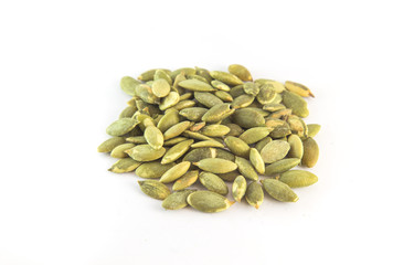 Pumpkin seeds on a white background