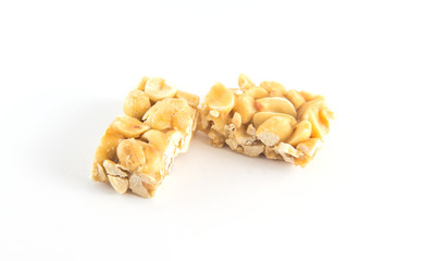 Peanut brittle isolated on white background