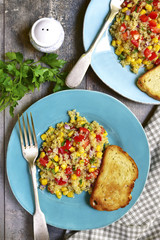 Quinoa salad with bell pepper,tomatoes,red onion,sweet corn and