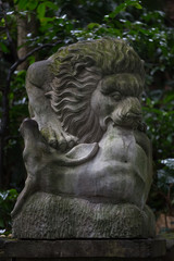Fototapeta premium Lion statue in Sacred Monkey Forest, Ubud, Bali, Indonesia