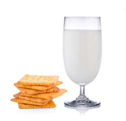  milk in the glass and Cracker on white background