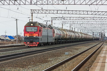 Fototapeta na wymiar Freight train with tank cars for transportation of petroleum products. The TRANS-Siberian railway. Western Siberia.