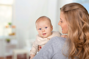 Happy young mother and her son