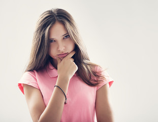 portrait of a beautiful young brunette in the studio on a white background