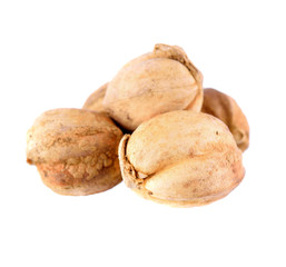 Cardamon seeds on white background