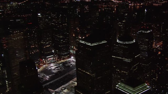 Night flight past Ground Zero to lower Manhattan. Shot in 2005.