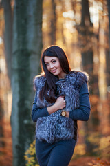 Girl in the autumn forest