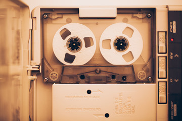 vintage audio tape compact cassette, sepia tone