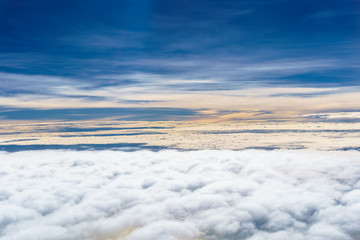Aerial view from an airplane on a cloudy day.