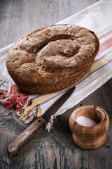 The rustic bread on the rough table