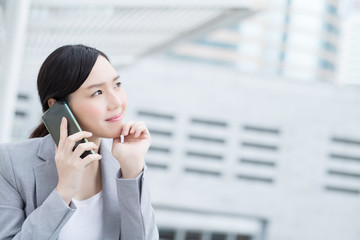 business woman speak smart phone