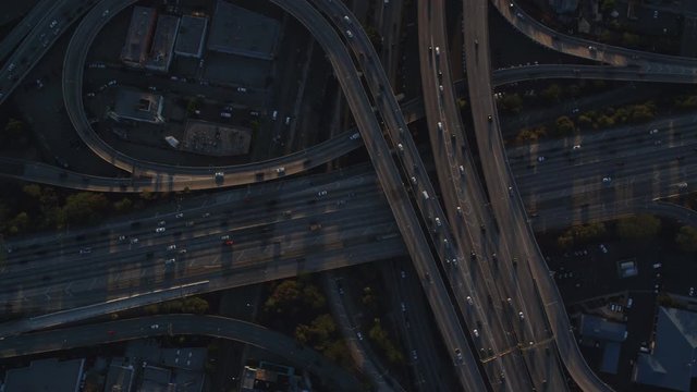 Looking down at a cloverleaf of highway interchanges in Los Angeles. Shot in October 2010.