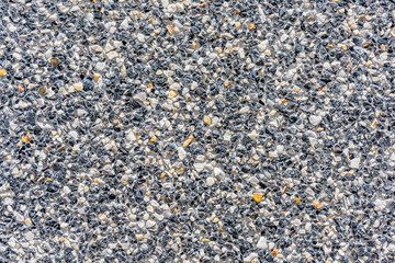 Cement mixed small gravel stone wall or floor texture background